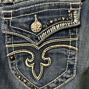 Rock Revival Jen Women's bootcut Blue Jeans with Embellished Pockets 31” inseam